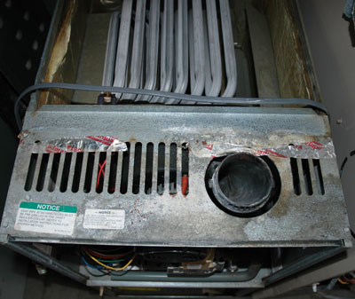 Rheem furnace showing signs of condensation damage